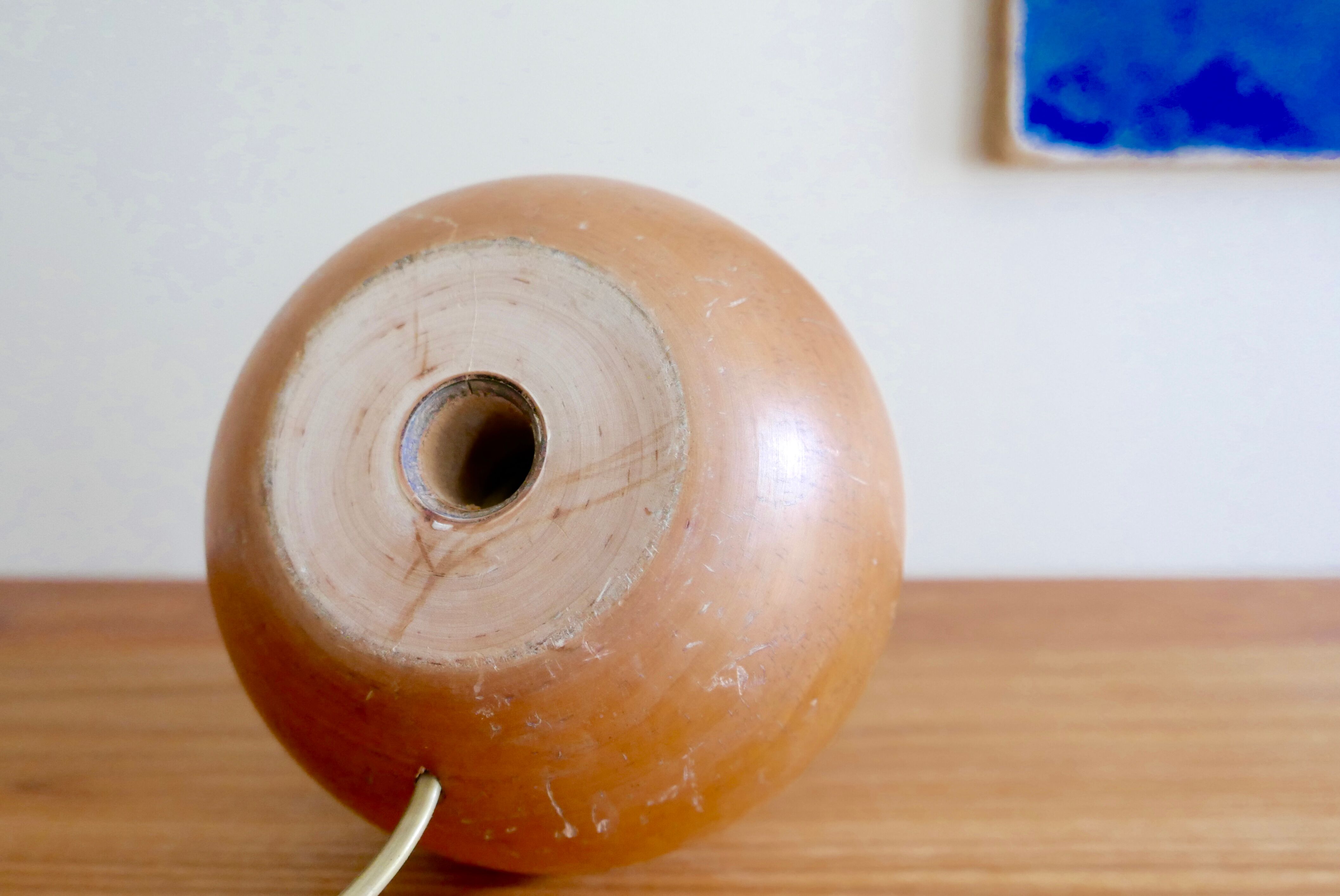 Wooden "ball" lamp, raffia shade, 70s