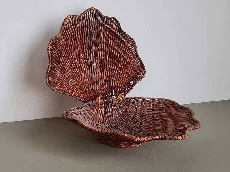 Vintage wicker shell basket, French bohemian decoration.