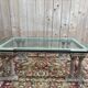 Coffee table with Corinthian columns and glass top