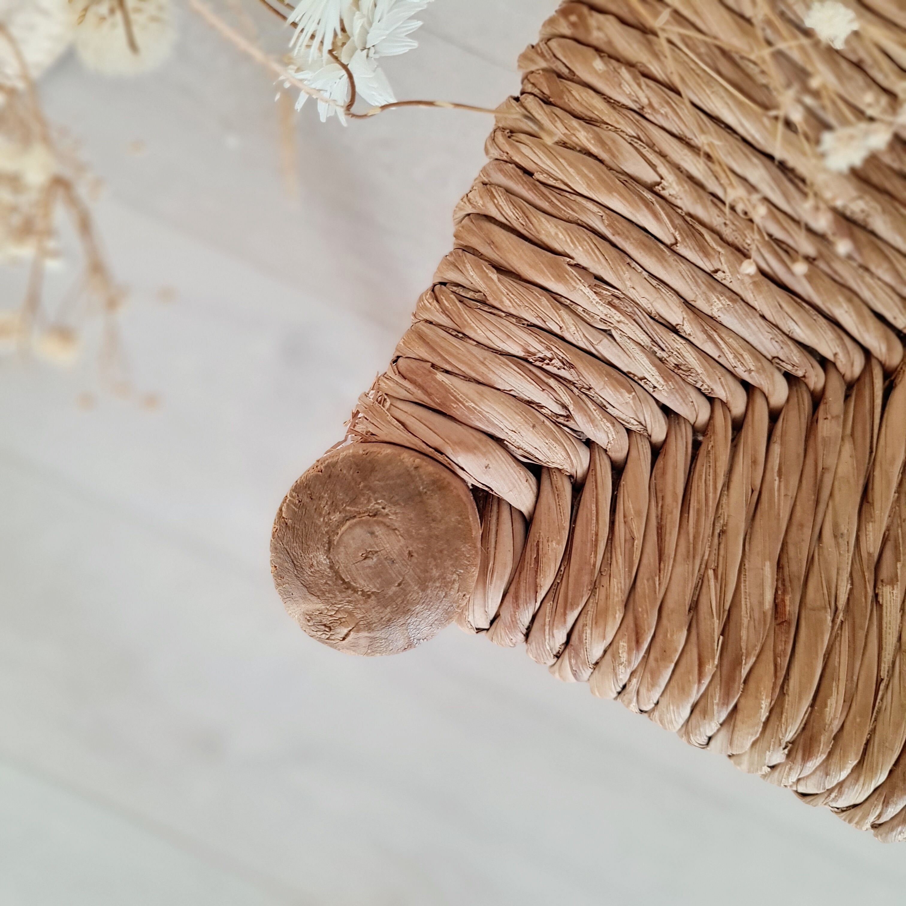 Old stool in wood and straw brutalist look