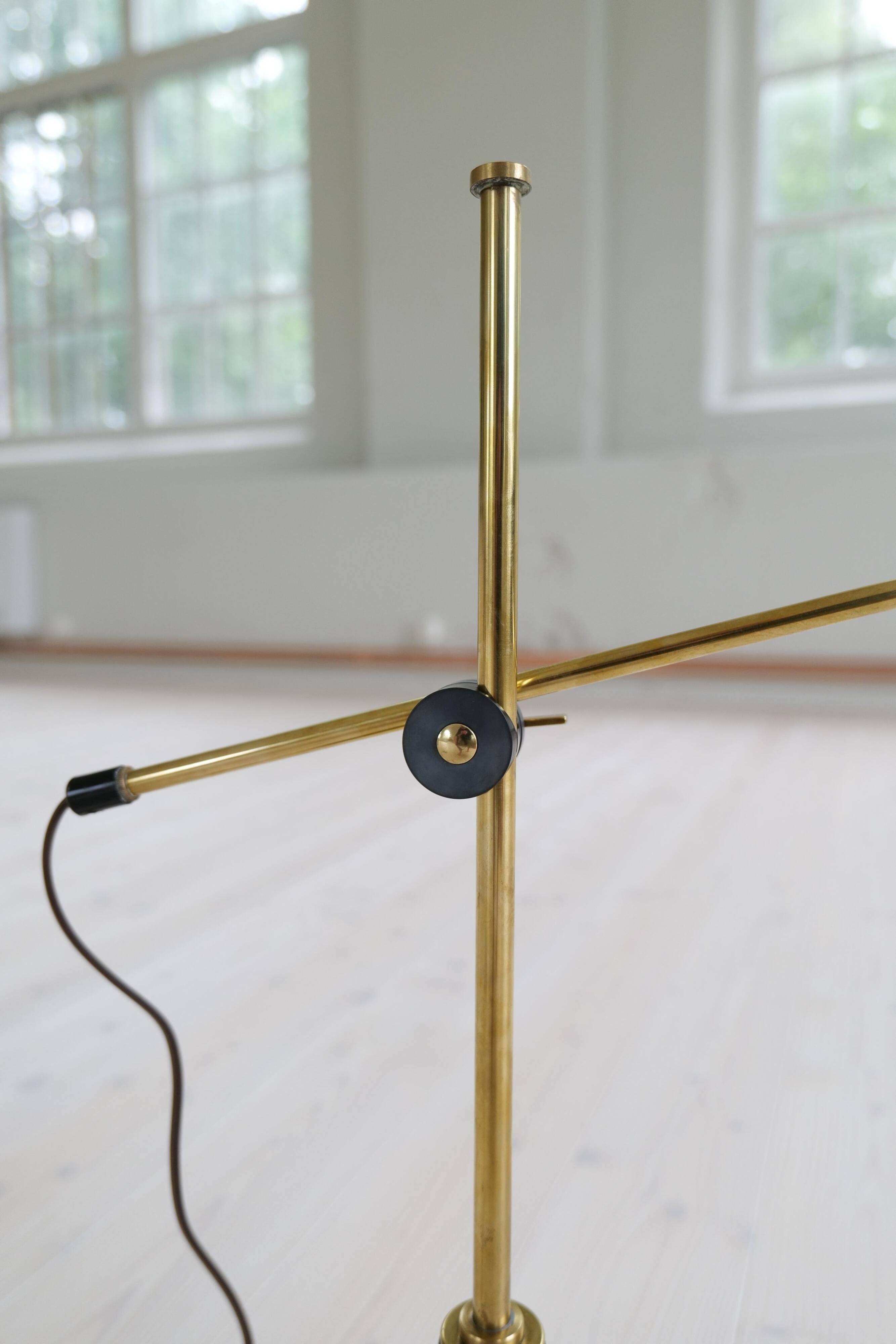 Mid-century modern table lamp in brass and walnut, rare by Einar Bäckström, Sweden.