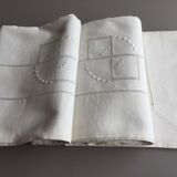 Old linen sheet embroidered with ecru-beige colors with monogram