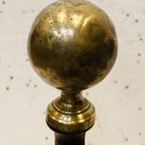 Paire de chenets porte buches en fer forgé XX siècle