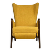 Fauteuil à oreilles avec repose-pieds rabattable en bouclé jaune, années 1950