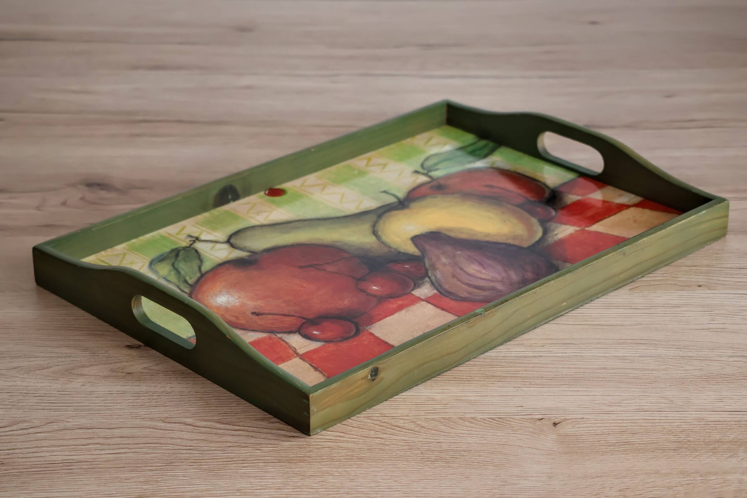 Wooden serving tray with fruit decor in green color