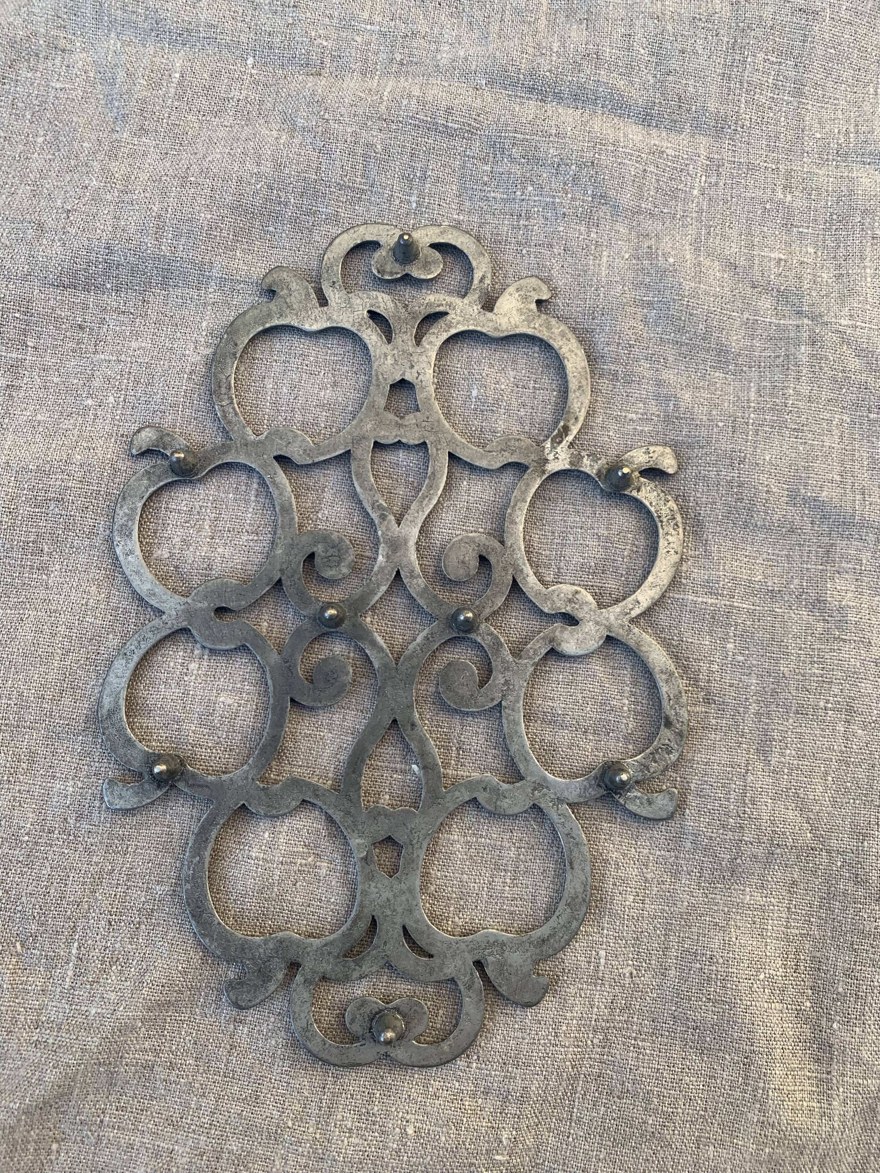 Pewter trivet, vintage apples model