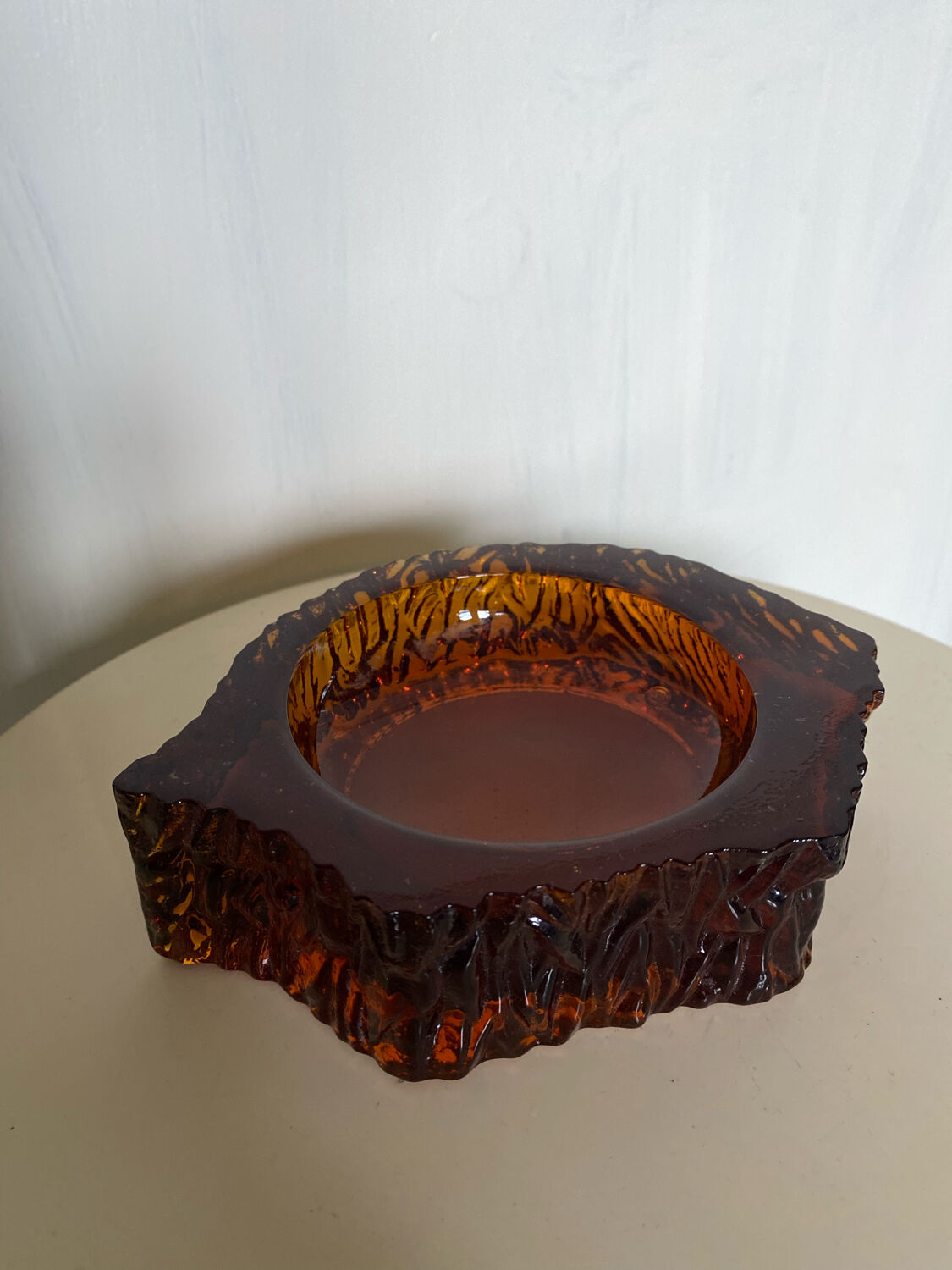 Ashtray in amber bubbled glass
