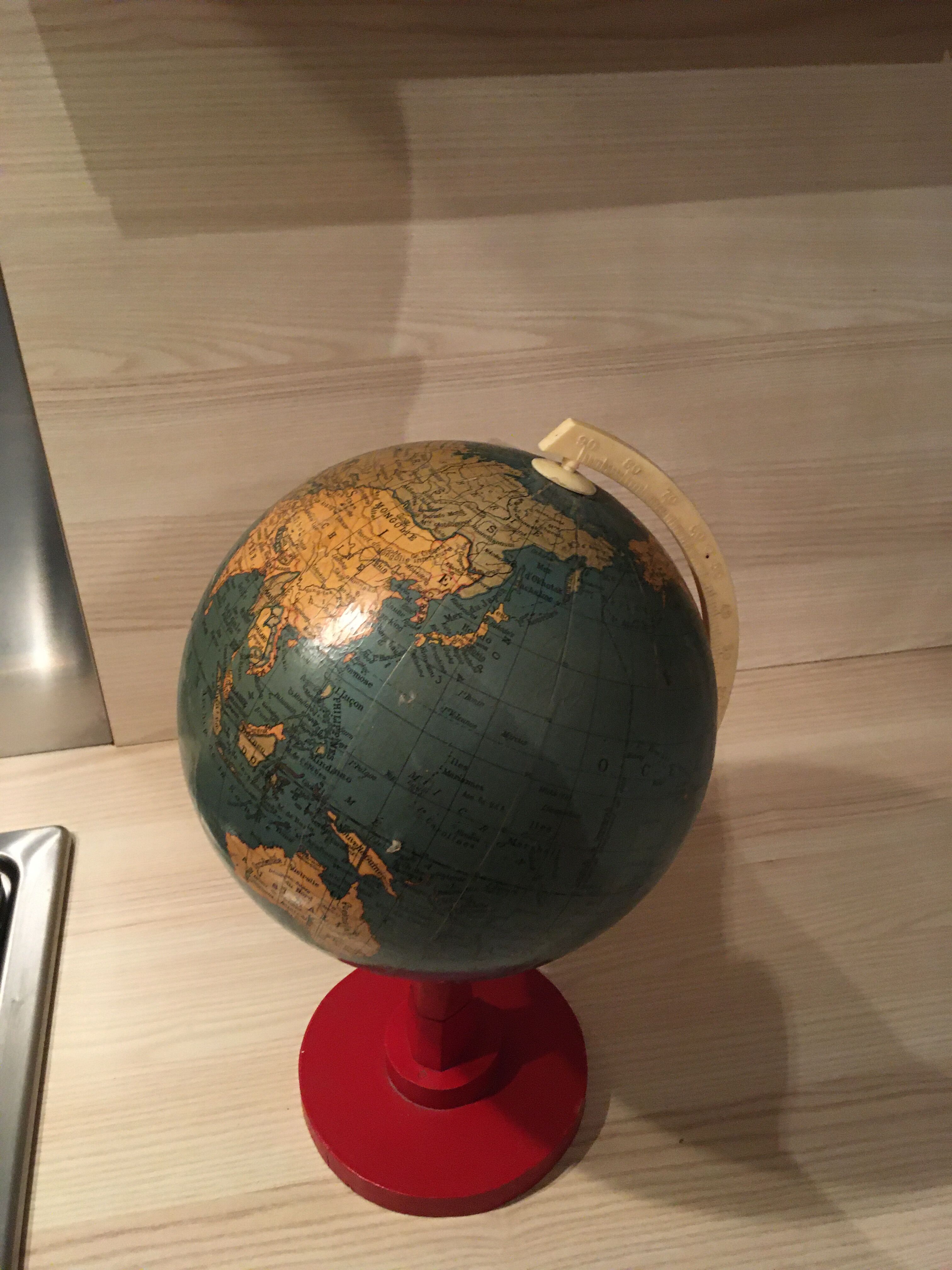Earth globe ancient wooden foot