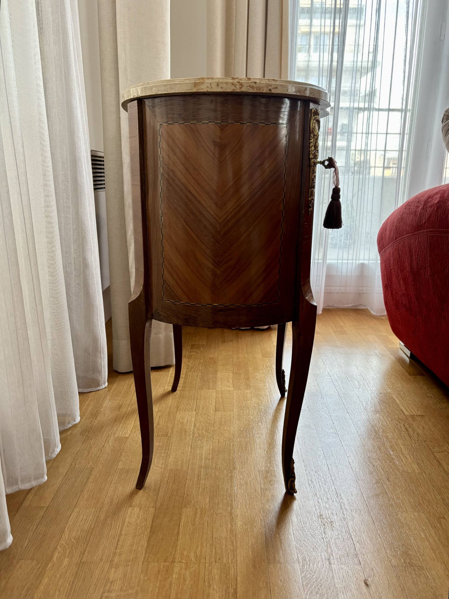 Louis XV chest of drawers in marquetry and gilded bronze, marble top