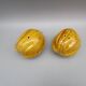 Pair of old earthenware salt/pepper shakers in “walnut” shape