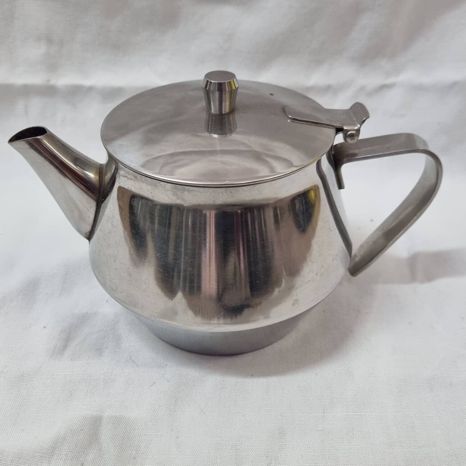 Stainless steel teapot and coffee pot from a boat, 1960