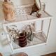 Vintage rattan and bamboo shelves painted white