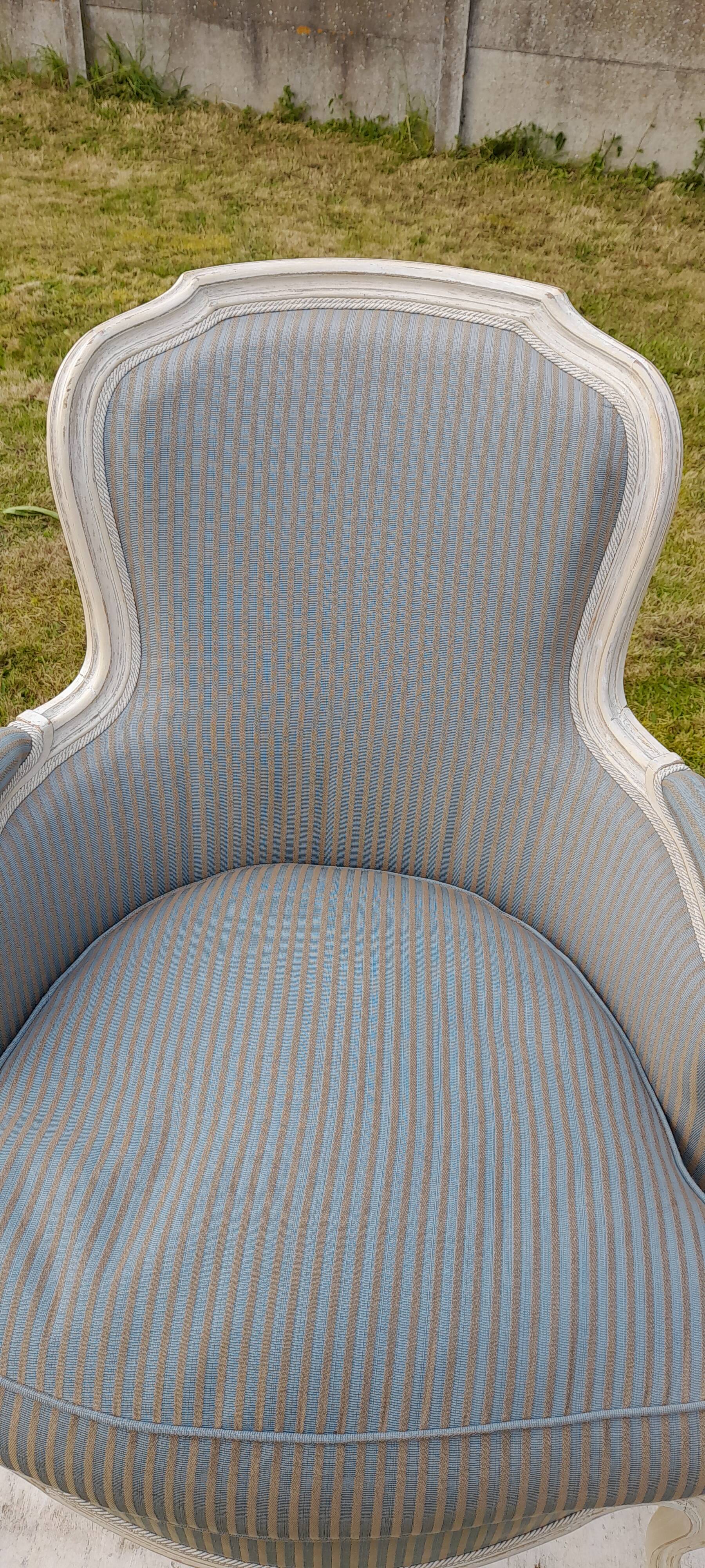 Bergère armchair with blue striped seat and back