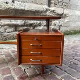 Mahogany desk with drawers by Jacques Hauville published by Bema.