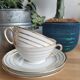 Set of 2 porcelain cups with saucers