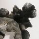 Pair of candlesticks restored to silver leaf