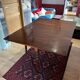 Vintage drop-leaf mahogany table; ideal for decorators.