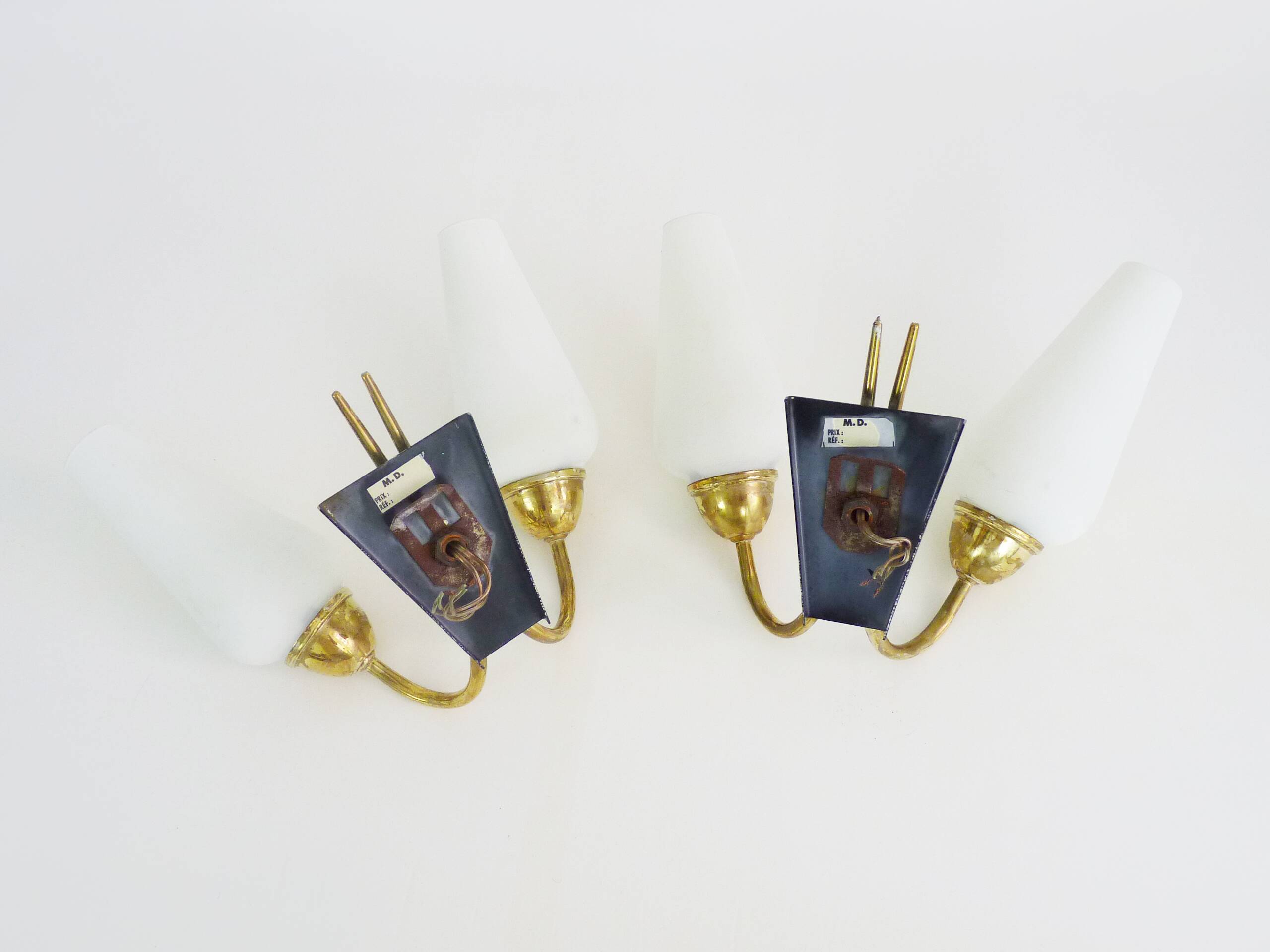 Pair of brass wall lights with double white tube lights. 70s