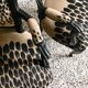 Restored Louis XV-style leopard convertible chairs