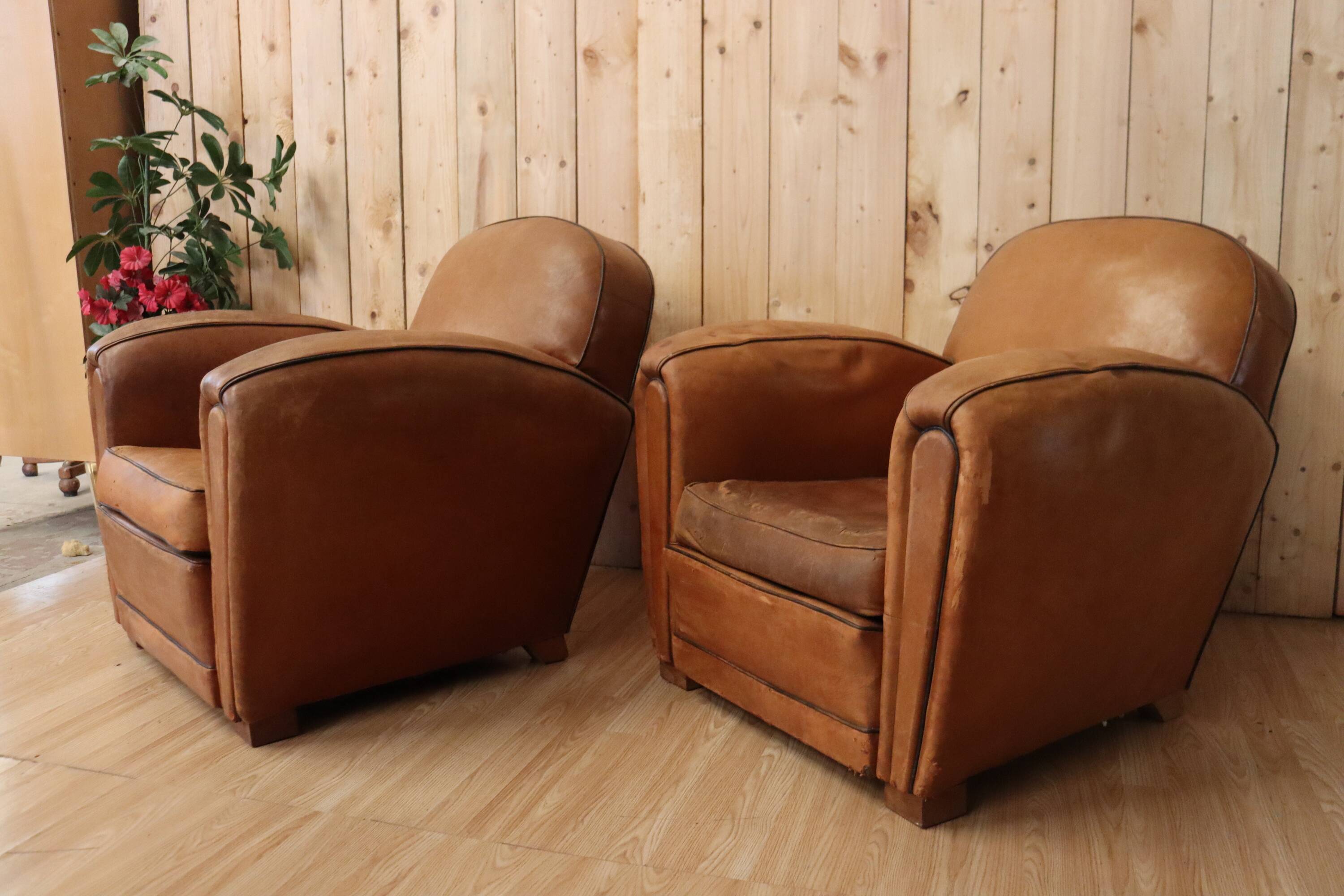 Pair of Art Deco leather club armchairs from the 1930s.