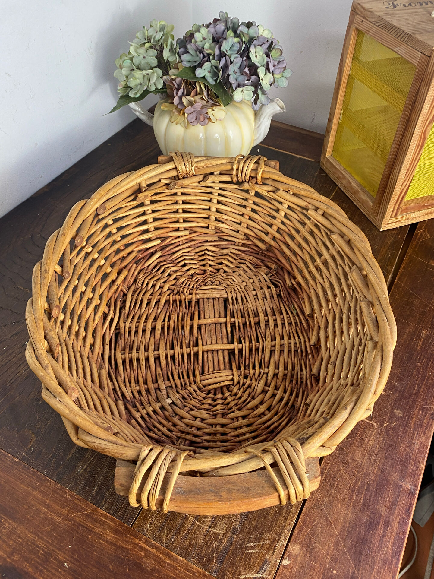Wicker basket with wooden handles