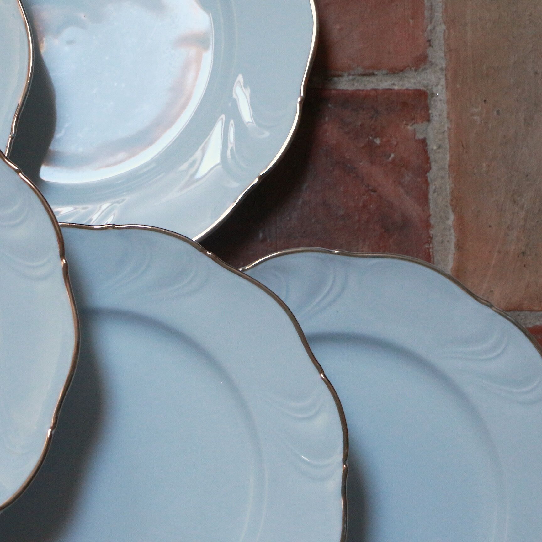 White and gold porcelain plates