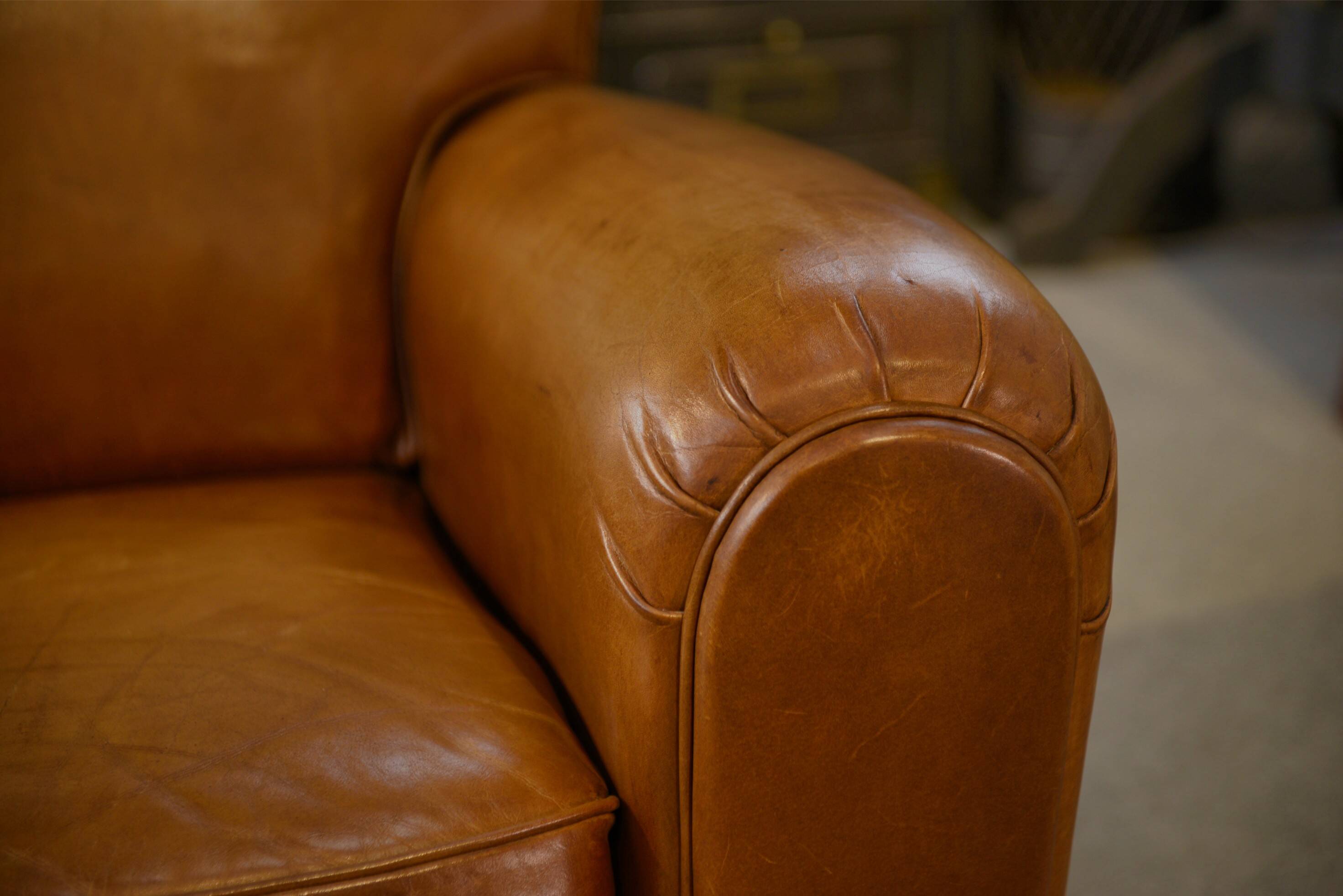 Pair of leather club armchairs