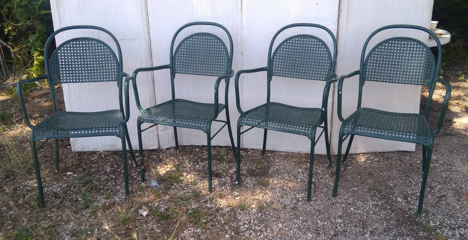 set of 4 perforated metal garden armchairs