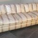 Sofa and armchair in colonial style with saber legs in resin, Italy, 1970s.