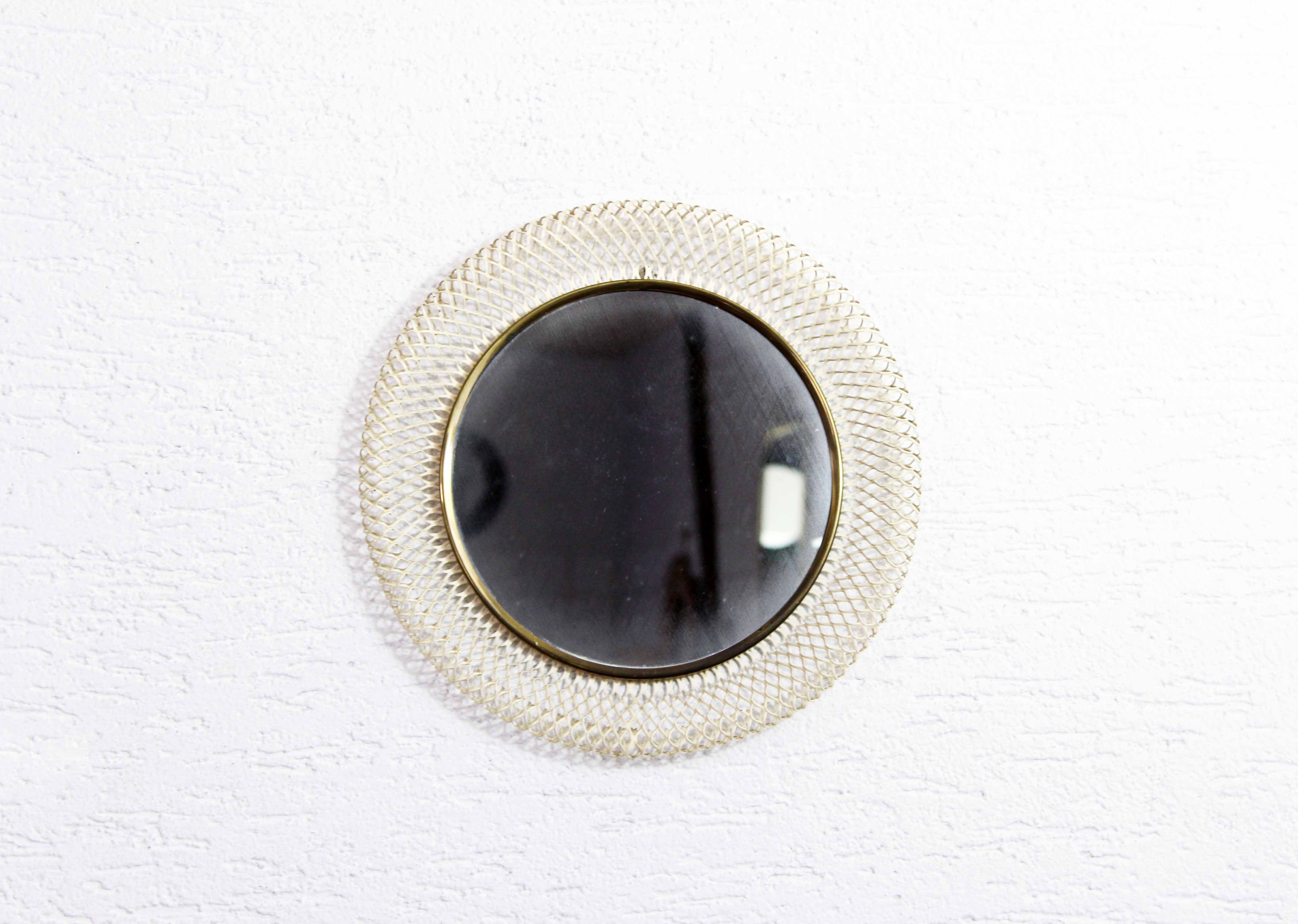 Round metal mirror 1950