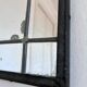 Art Deco black wrought iron wall mirror, Belgium, 1930s