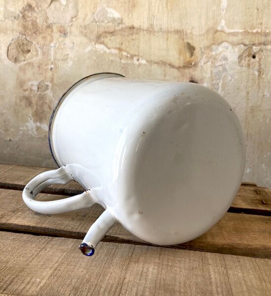 Old white and blue enamelled enema pot