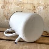 Old white and blue enamelled enema pot