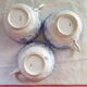 Trio of fine porcelain cups