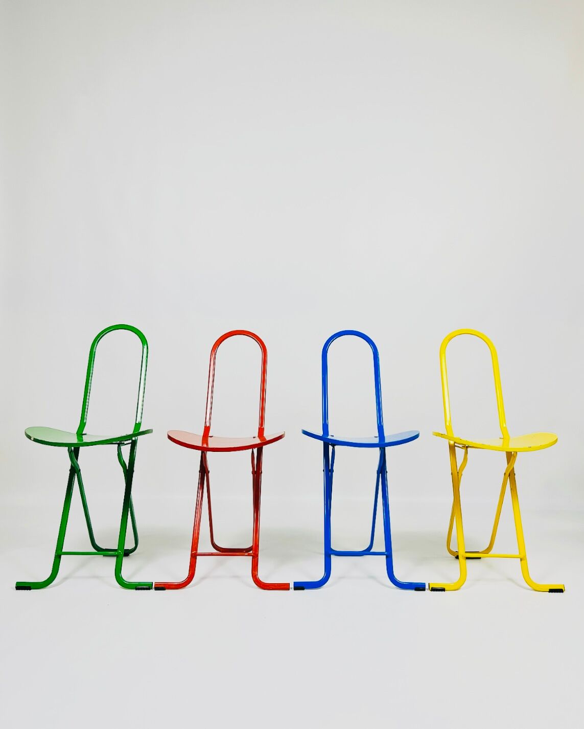 Dafne folding chair (colorful set) designed by Gastone Rinaldi
