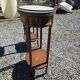 Pair of Louis XVI style bedside tables in mahogany, with marble tops.