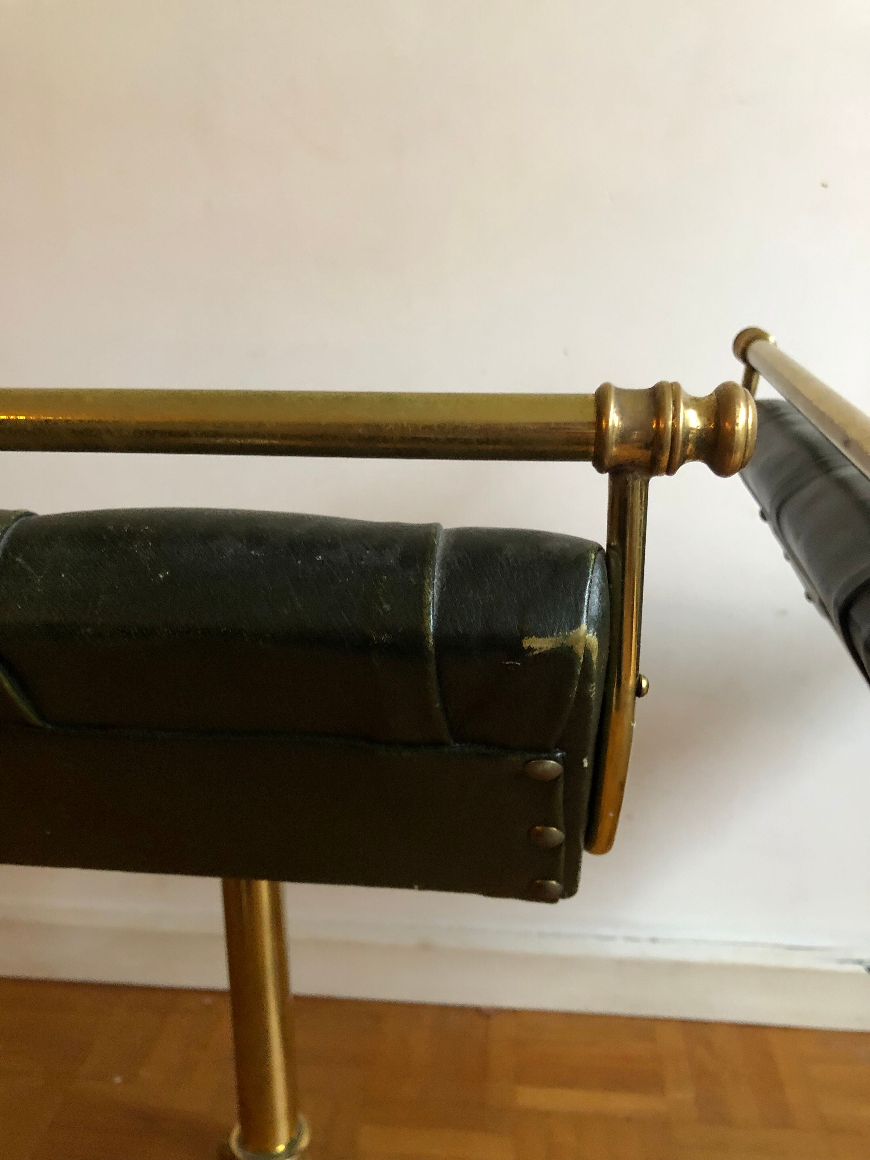 Pair of Chesterfield style brass and leather stools