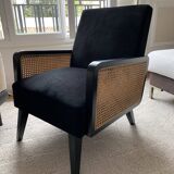 Fauteuil en velours noir et cannage