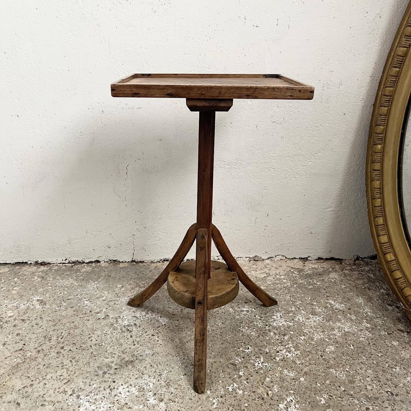Old primitive wooden tripod pedestal table