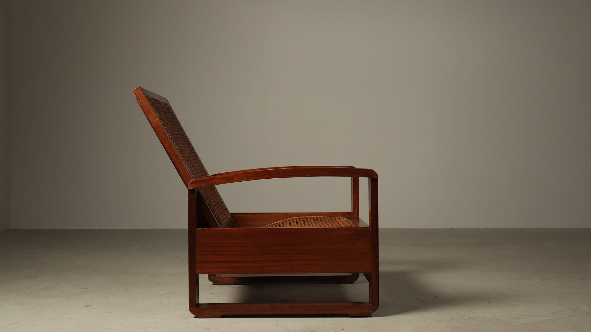 Mid-century architectural teak lounge chair with cane seat, 1950s