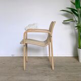 Vintage armchair in caning