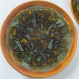 Set of 4 flamed enamel plates in green and amber from the 60s-70s.