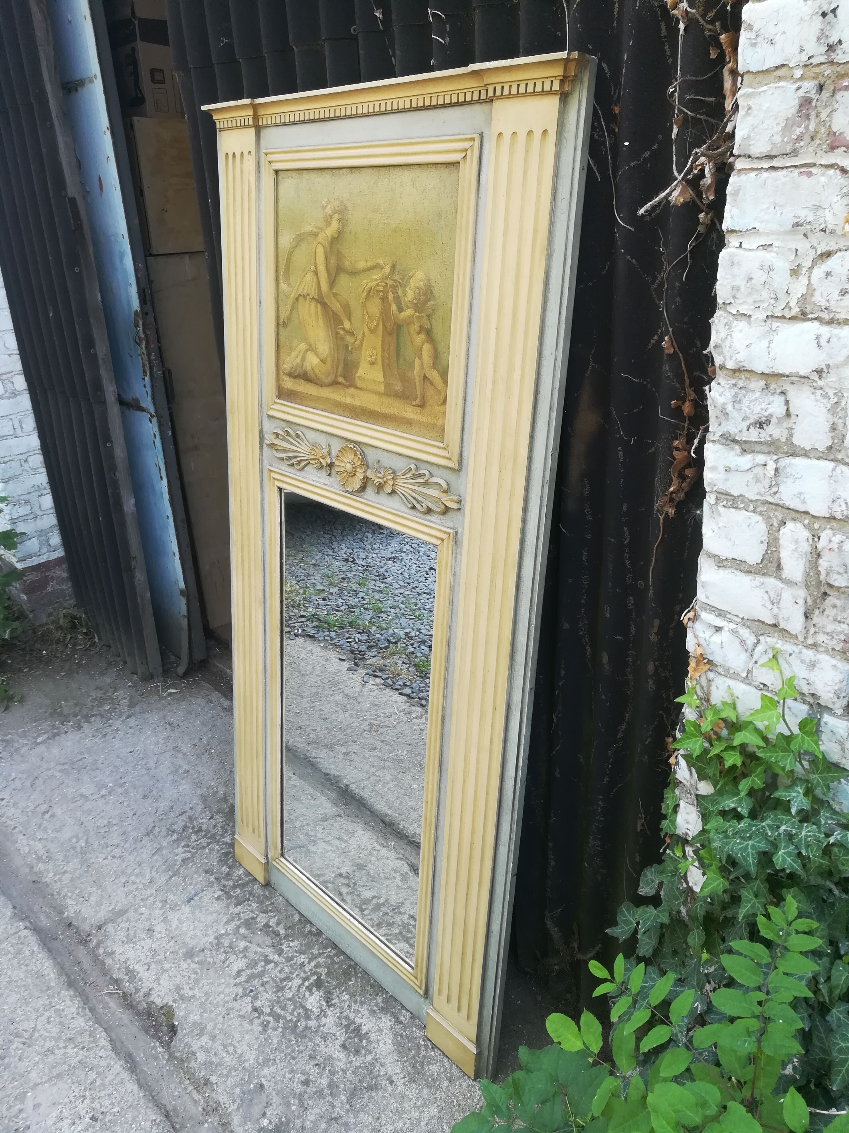 Miroir trumeau style Louis XVI en bois patiné