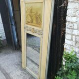 Louis XVI style trumeau mirror in patinated wood