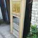Louis XVI style trumeau mirror in patinated wood