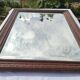Grand miroir ancien biseauté cadre en bois sculpté