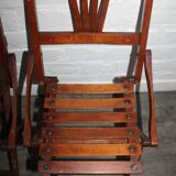 2 wooden folding chairs
