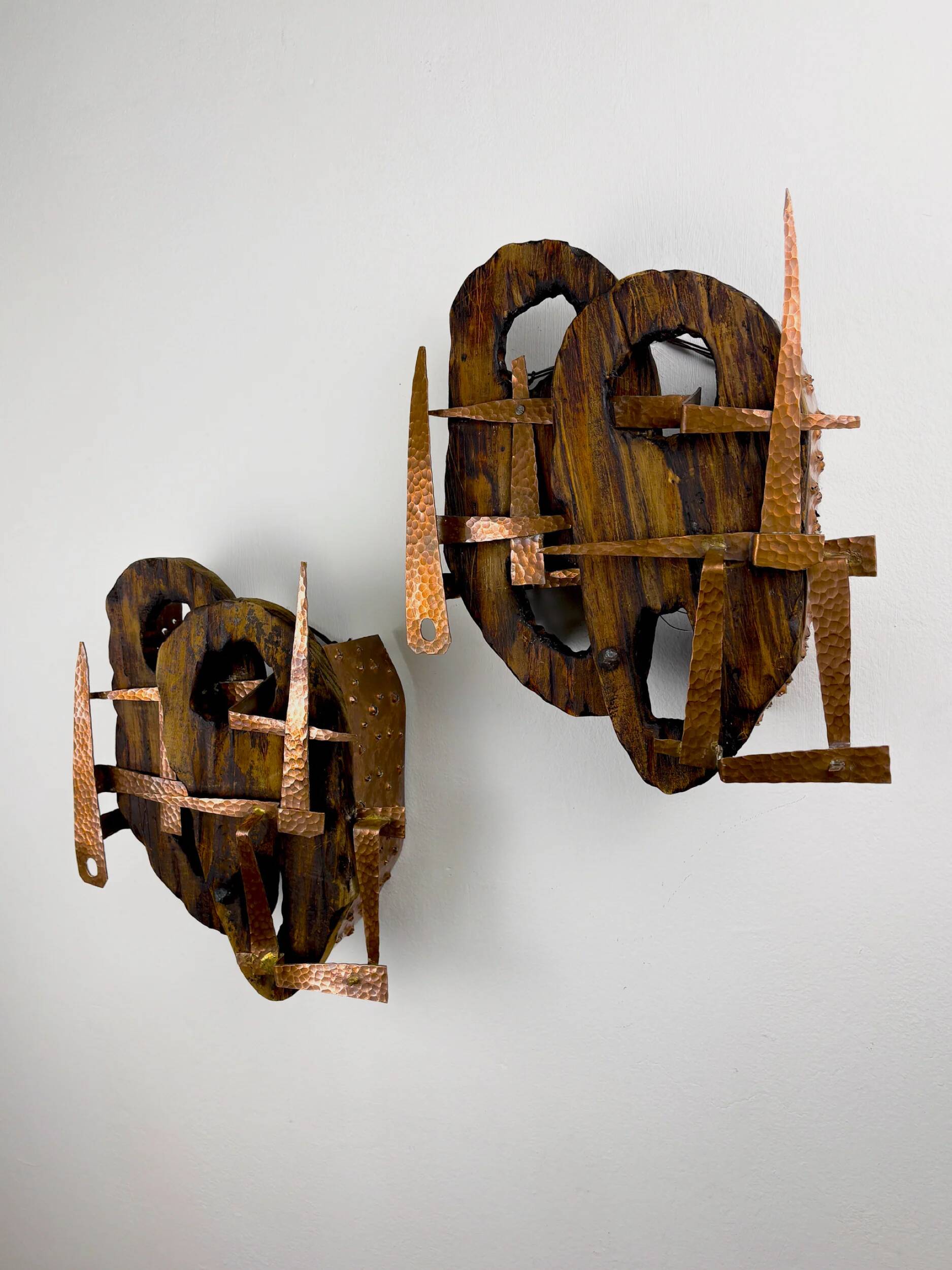 Pair of Brutalist wood & copper wall sconces, Italy, 1970s