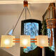 Vintage 1950s Scandinavian teak and perspex pendant light.