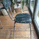 4 chairs in very dark green formica marble effect